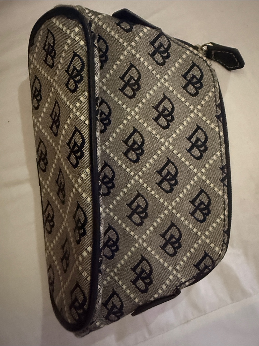 Dooney and Bourke Branded Monogram Toiletry Bag in Gray